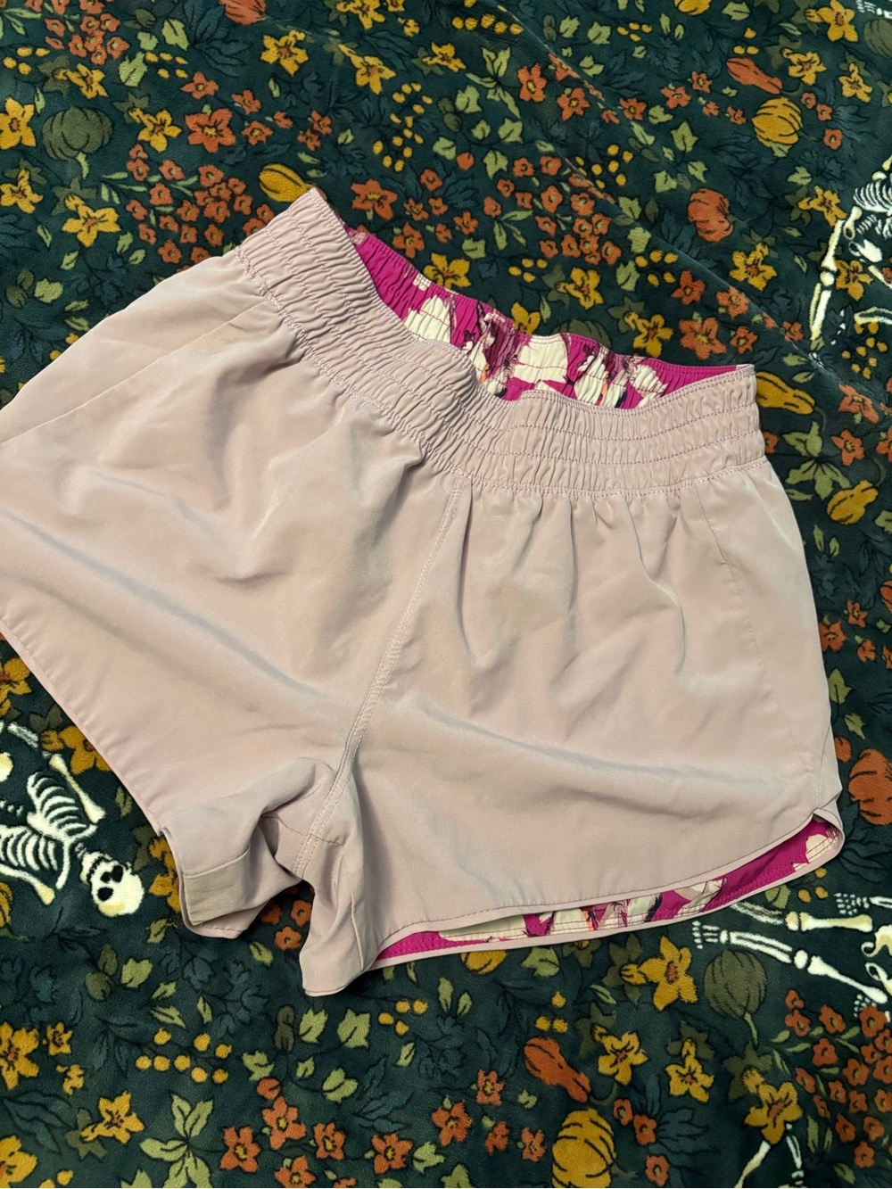Reversible lilac and floral print shorts